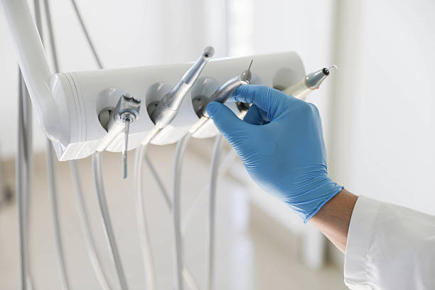Professional Tooth Extraction technician working in Armada, MI